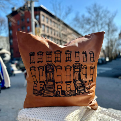 The Brownstones, 26x26 Embroidered Faux Leather Pillow